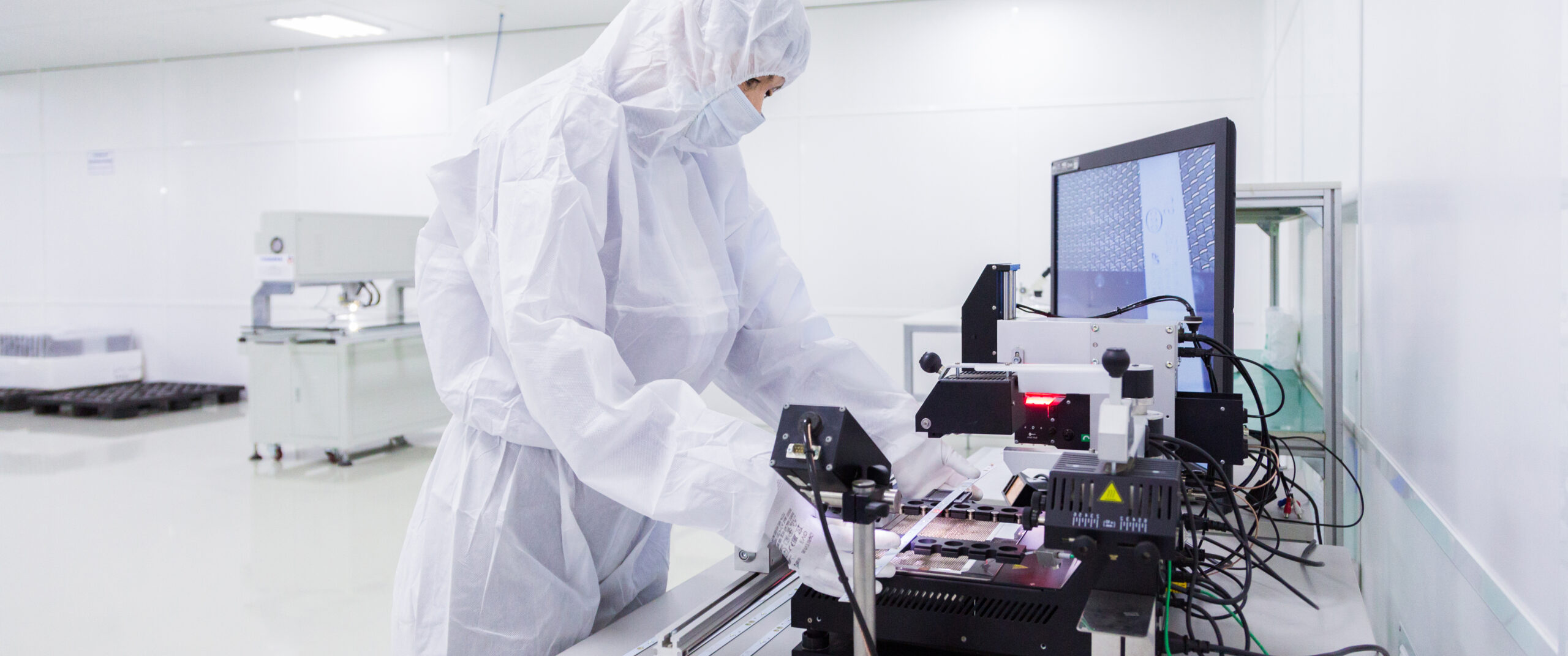 https://yaopengtrading.com/wp-content/uploads/2023/08/factory-worker-white-lab-suit-latex-gloves-face-mask-working-with-some-modern-equipment-during-manufacturing-tv-set-scaled.jpg